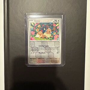 Eevee Collectible Card with Floral Background